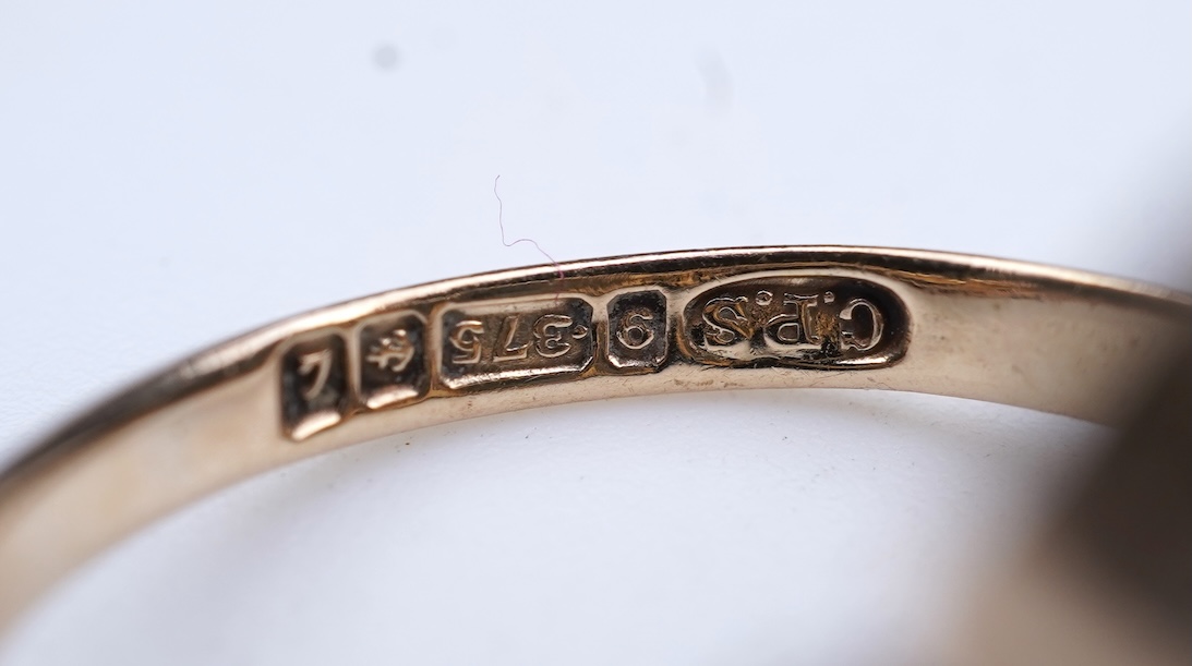 Four gem-set rings